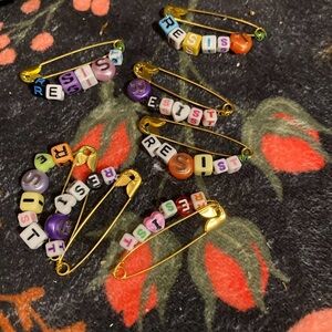 Colorful Beaded 'Resist' Safety Pins